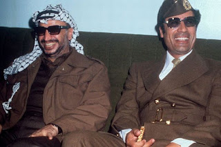 Yasser Arafat with Gaddafi in 1977. Credit: Rex Features; Wikipedia photo