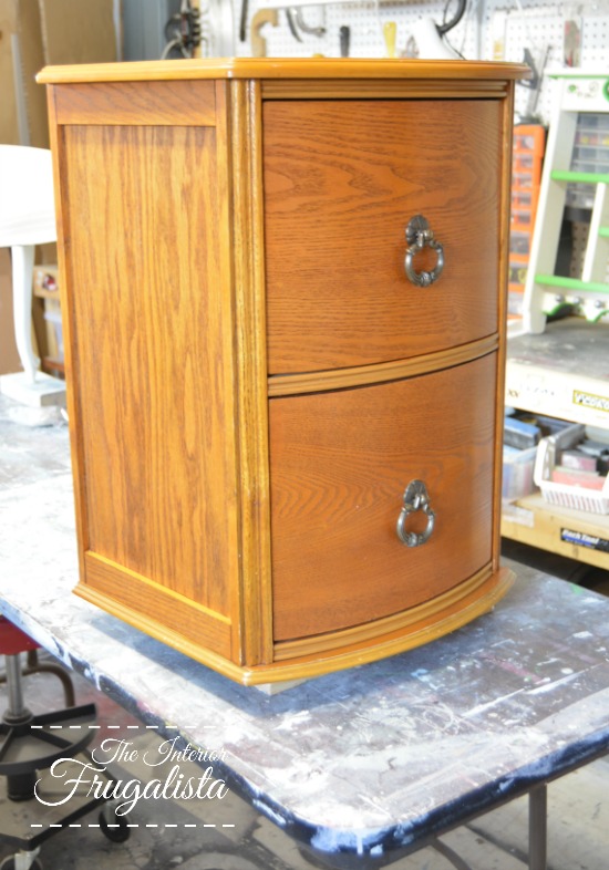 Oak curved front file cabinet before