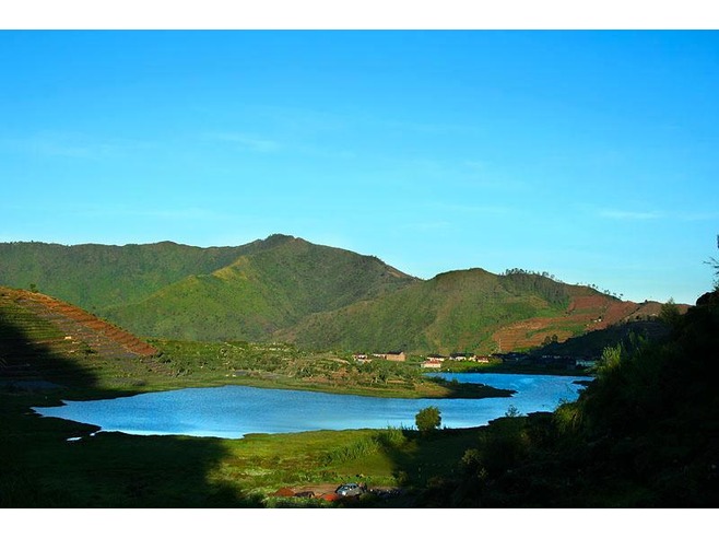 Sikunir Mountain and Kecebong Lake at Dieng Plateau