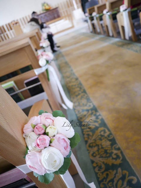 church wedding pew end floral decoration by Lily Sarah