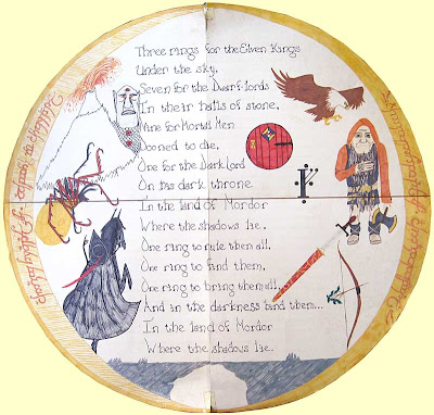 Circular artwork with the Ring as a frame and the Ring poem in the center, surrounded by spot illustrations of a dwarf, eagle, orc and other Tolkien inventions