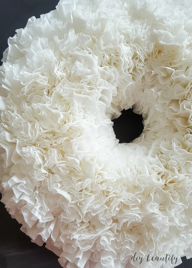 ruffled petals of coffee filter wreath