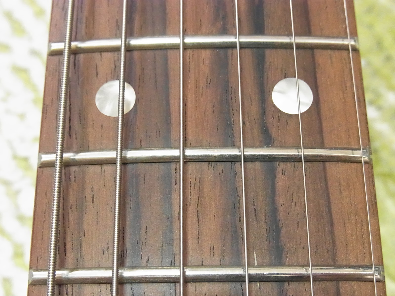 ミディアムスケールのテレキャスにロングスケールのストラトネックを