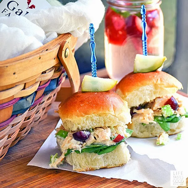 Chicken Salad Sliders | by Life Tastes Good combine a classic lunch sandwich favorite with the convenience of a slider bun. Freshly shredded chicken mixed with mayonnaise for creaminess, celery for a nice crunch, and a handful of refreshing grapes add a tasty sweetness. Perfect for lunch, dinner, or a fun picnic outing with the family!