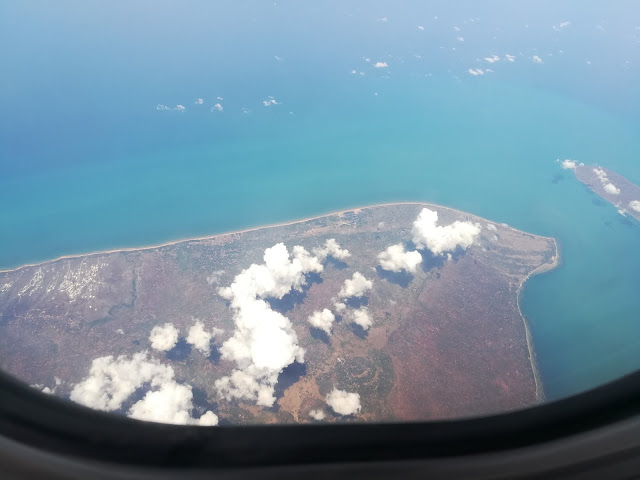 scenic views of Bali indonesia from window seat of malindo plane