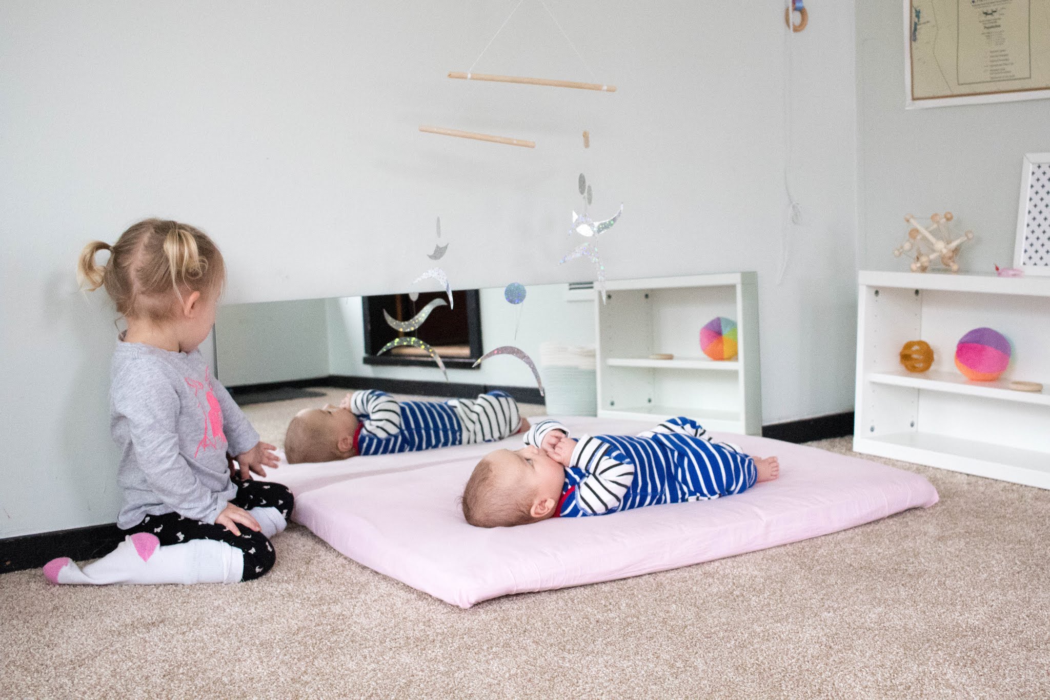 8 tips for creating a Montessori baby space when you have multiple kids