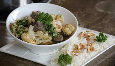Yakhnit Zahra (cauliflower stew with rice)
