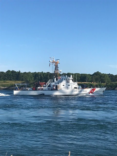 coast guard passing through the canal