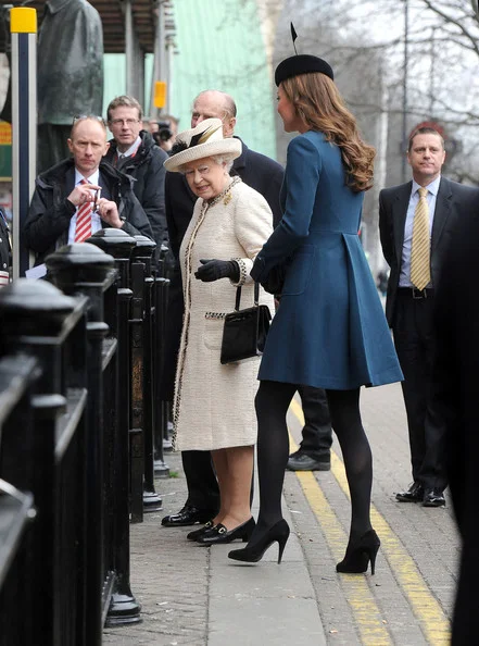 Queen Elizabeth II, accompanied by Prince Philip and Kate Middleton visited the Baker Street underground station