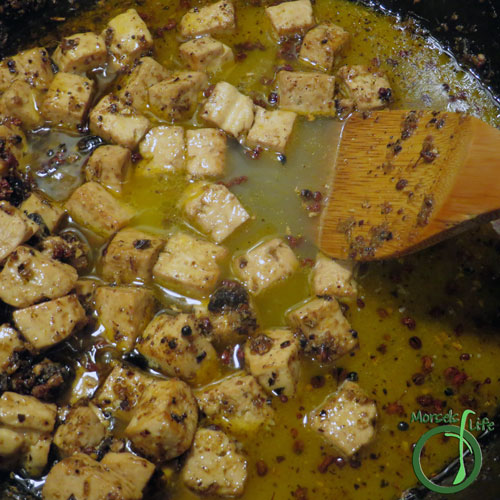 Morsels of Life - MaPo Tofu Step 7 - Mix corn starch into chicken stock, then pour mixture into pot, simmering until thickened.