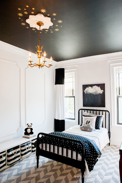 little girl room with black furniture