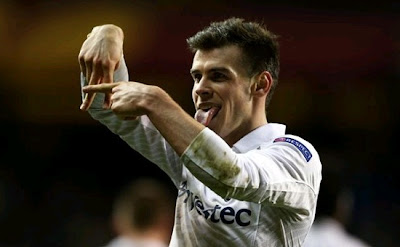 Bale celebrates a goal with Tottenham