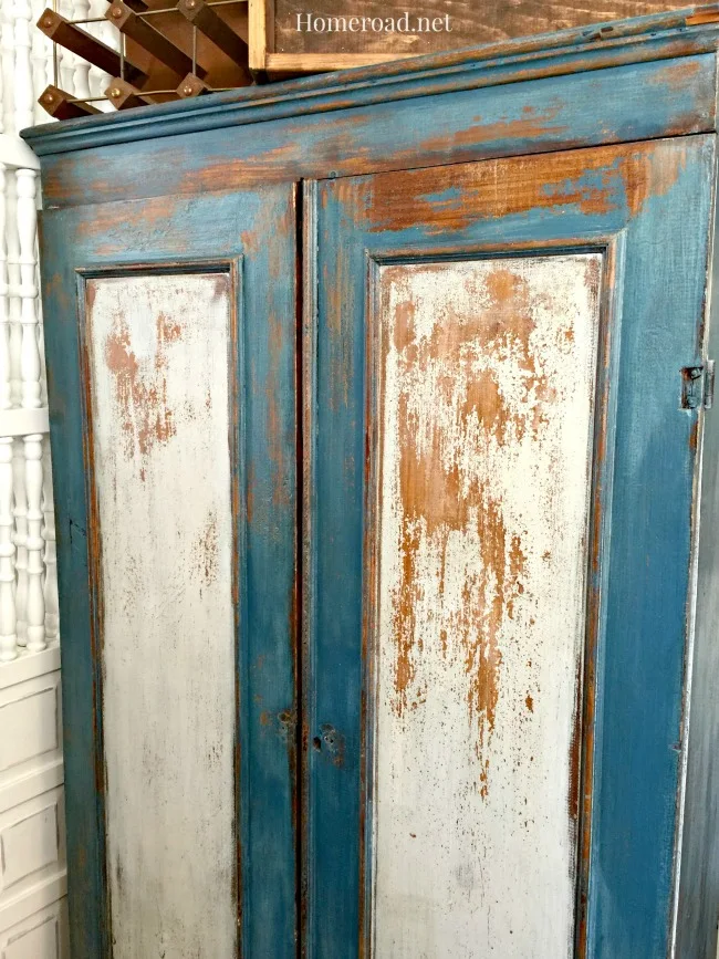 Blue and white chippy cabinet