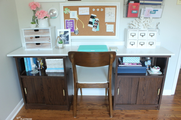 The Goodwill cabinets are unrecognizable in the office desk and gallery wall reveal!