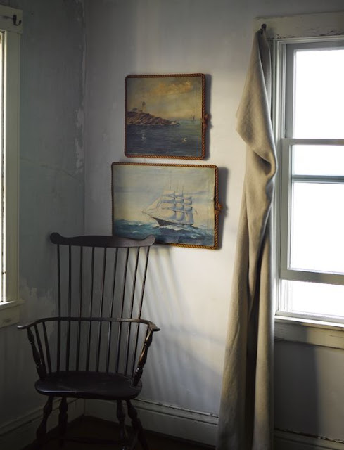 Charming country coastal room seascape paintings windsor chair Ken Fulk