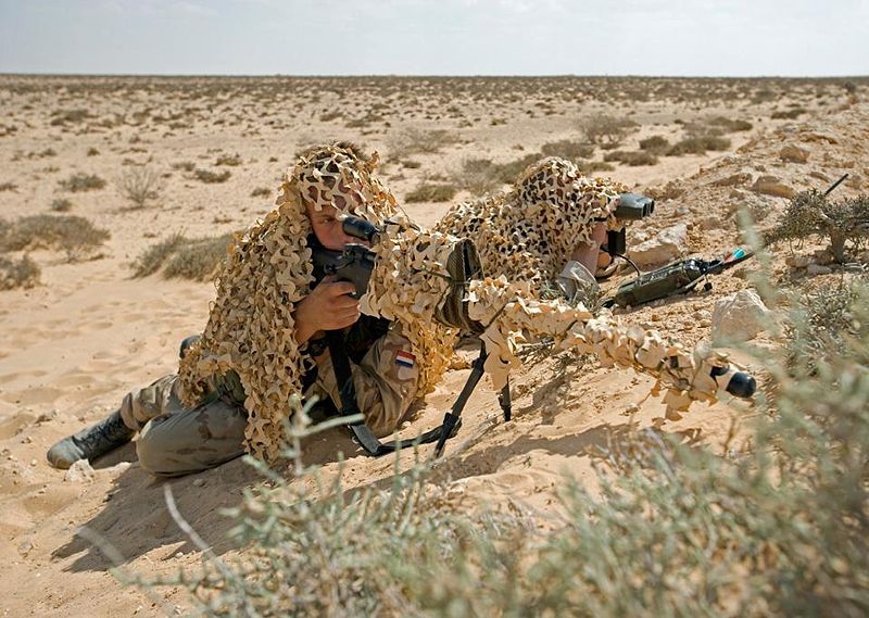 Dutch+ISAF+sniper+team+firing+AWSM+.338+Lapua+Magnum+rifle+and+Leica-Vectronix+VECTOR+IV+laser+rangefinder+binoculars.jpg