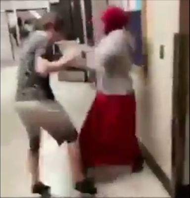 2 Lol. Muslim girl beats up boy who triedtried to remove her hijab (Video)