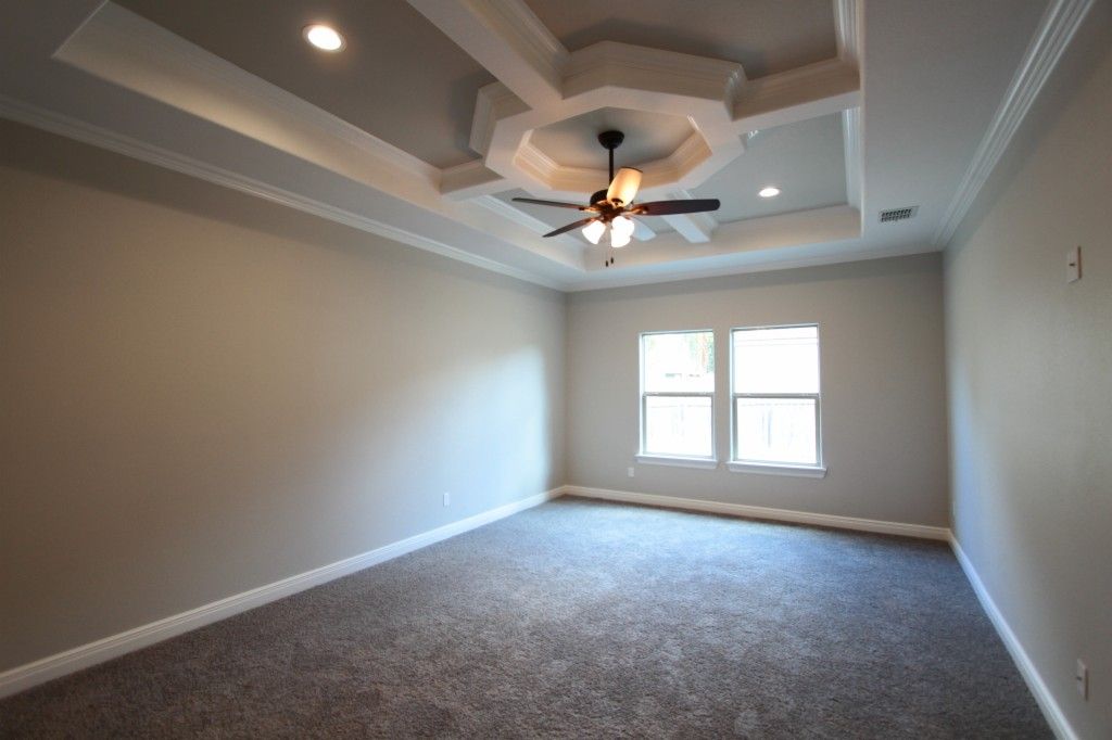 Neutral gray and white master bedroom interior | via monicawantsit.com