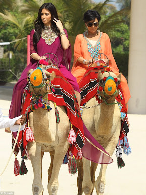 OMG..How did Kim Kardashian mount a Camel With 8 Inches Louboutins 17