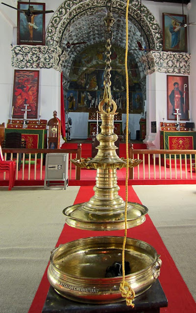 brass lamps at ancient Kerala church