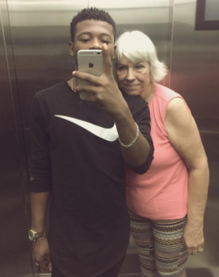 Nigerian man & his older white lover take an elevator selfie