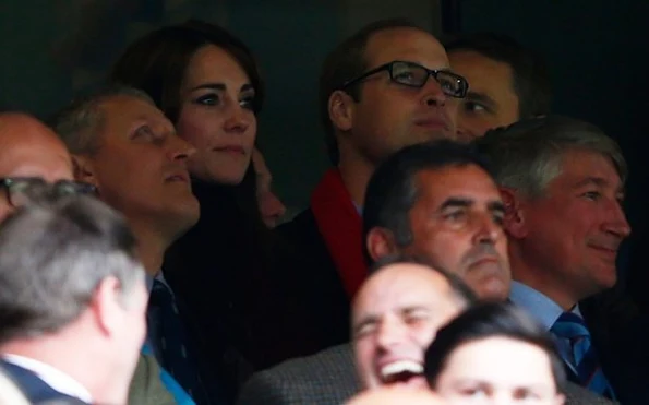 Kate Middleton and Prince William attend the Australia v Wales match during the Rugby World Cup 2015 at Twickenham Stadium