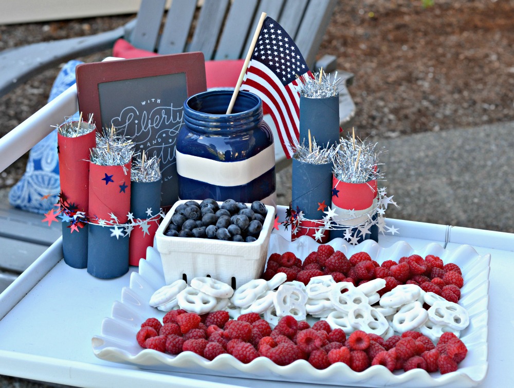 red, white and blue, raspberries, blueberries, pretzels