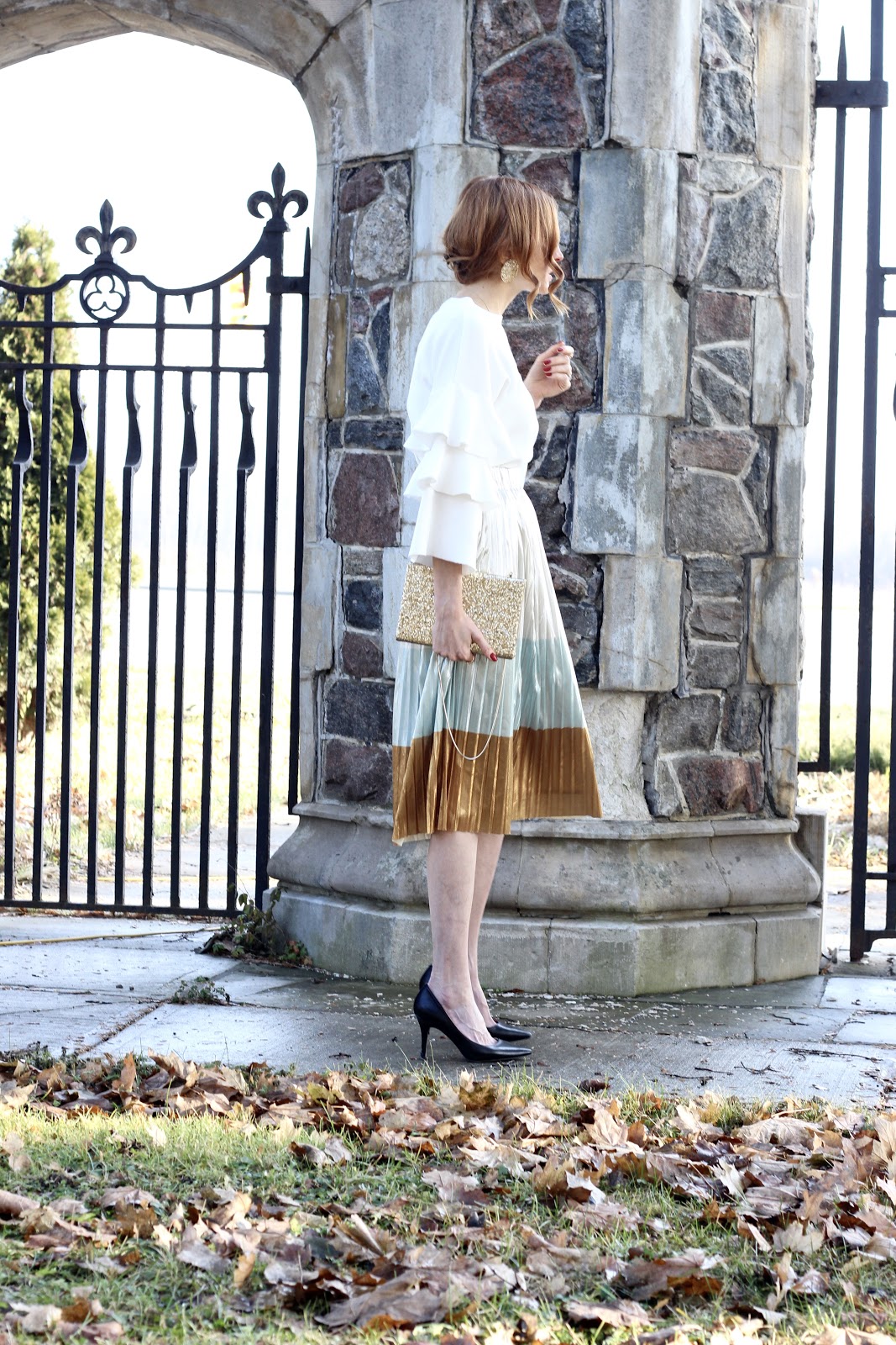 Holiday glam-- Zara pleated midi color block gold, silver, blue, White tier sleeve sweater Chicwish, Nine West pumps, Kate spade gold sequin clutch, white and gold earrings