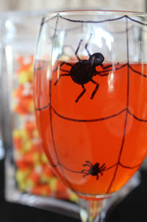 Make your own Halloween glasses and plates to decorate your dinner table.  Using this simple technique, the full moons the limit with your Halloween designs.  I chose a fun spider for my glasses and dishes that made the party a little more creepy!