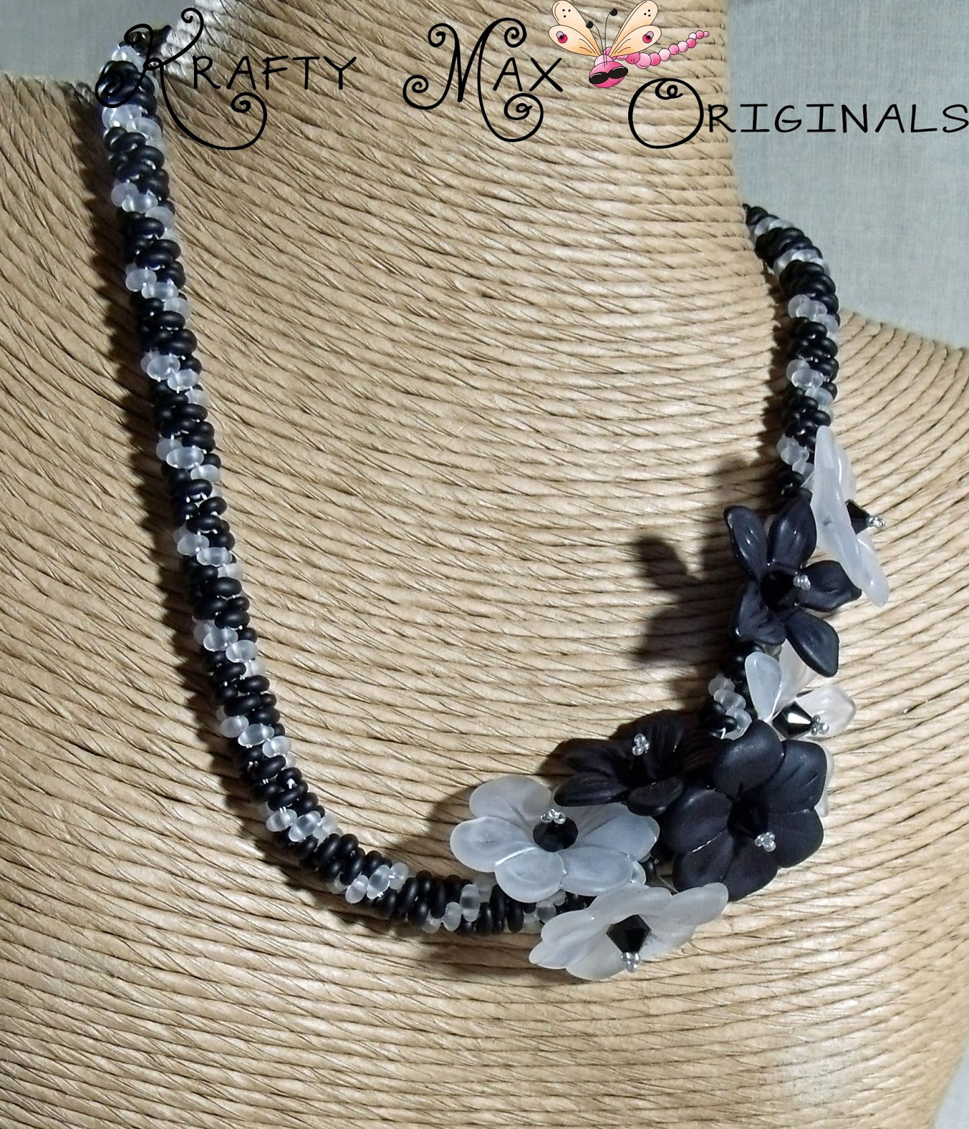 http://www.lajuliet.com/index.php/2013-01-04-15-21-51/ad/beadwork,46/exclusive-black-and-white-flowery-grace-beadwoven-necklace-a-krafty-max-original-design,346