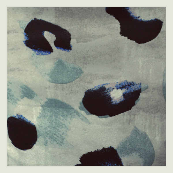 ASOS animal print wiggle dress fabric close up of blue leopard print fabric of dress