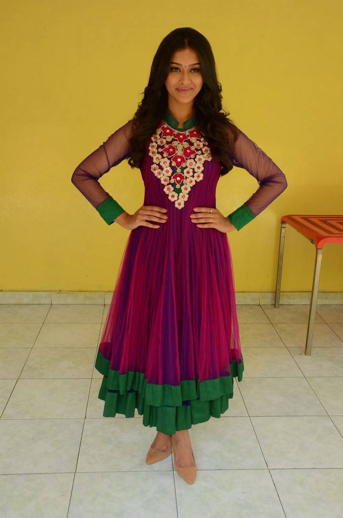 Pooja Jhaveri Stills In Maroon Dress At Film Success Meet