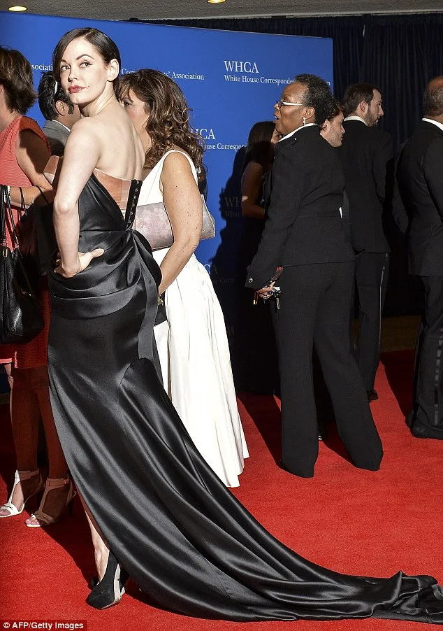 Rosie McGowan exposes rose-gold corset at the 2014 White House Correspondents' Dinner