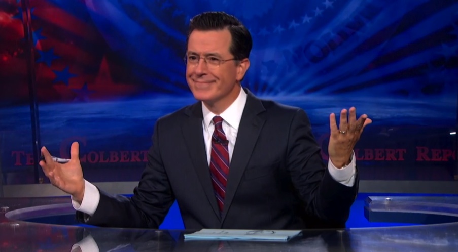 Stephen Colbert at his desk on set