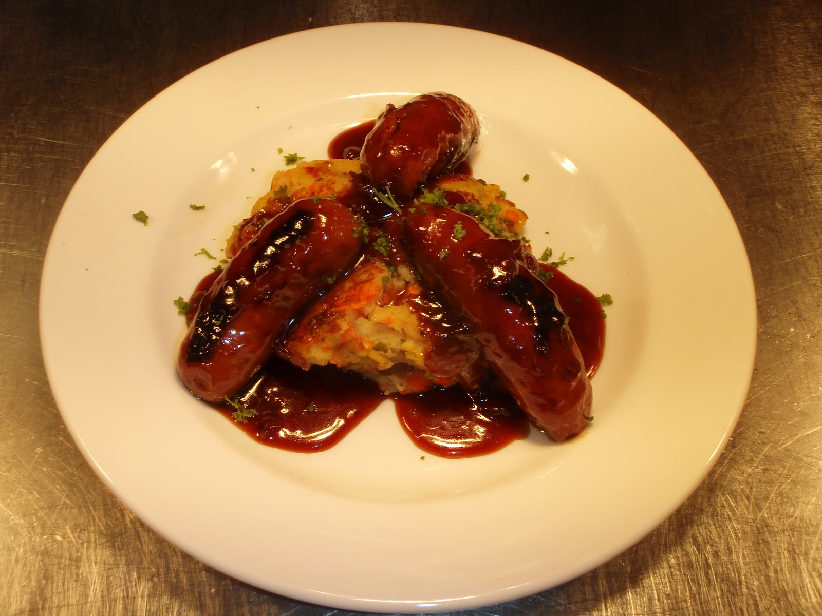 Styles Of Cooking SAUSAGES IN RED ONION MARMALADE SAUCE SERVED WITH