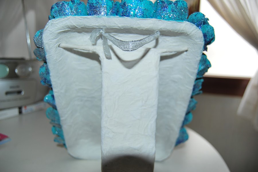 Pie de cuadro de flores de carton