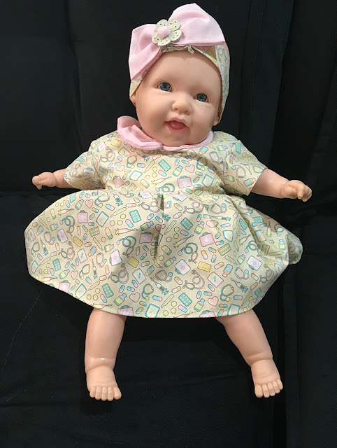 boneca bebê dodói com vestido novo
