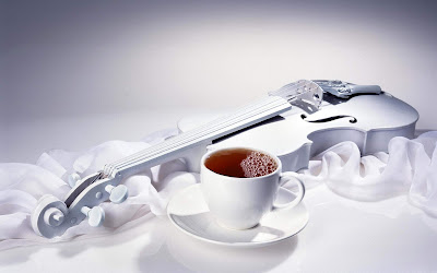 White violins with a cup of tea - Music Violins Collection