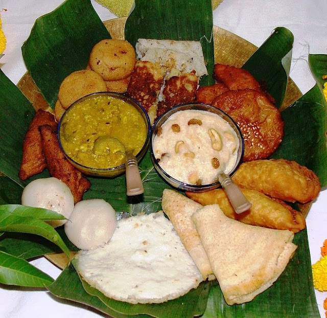 An assortment of various pithas made during the Raja festival