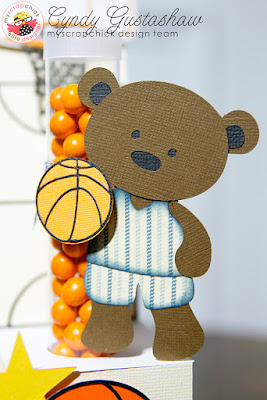 Treat holder for test tubes decorated as a basketball court