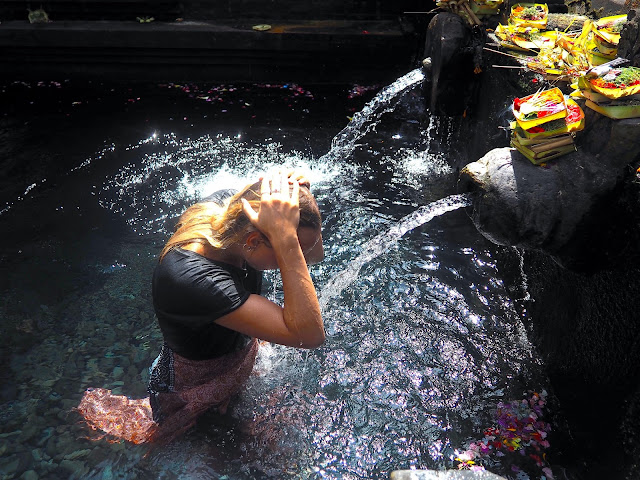 Bathing ritual in Tirta Empul water temple, near Ubud, Bali, Indonesia