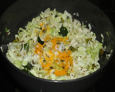 add cabbage and turmeric powder
