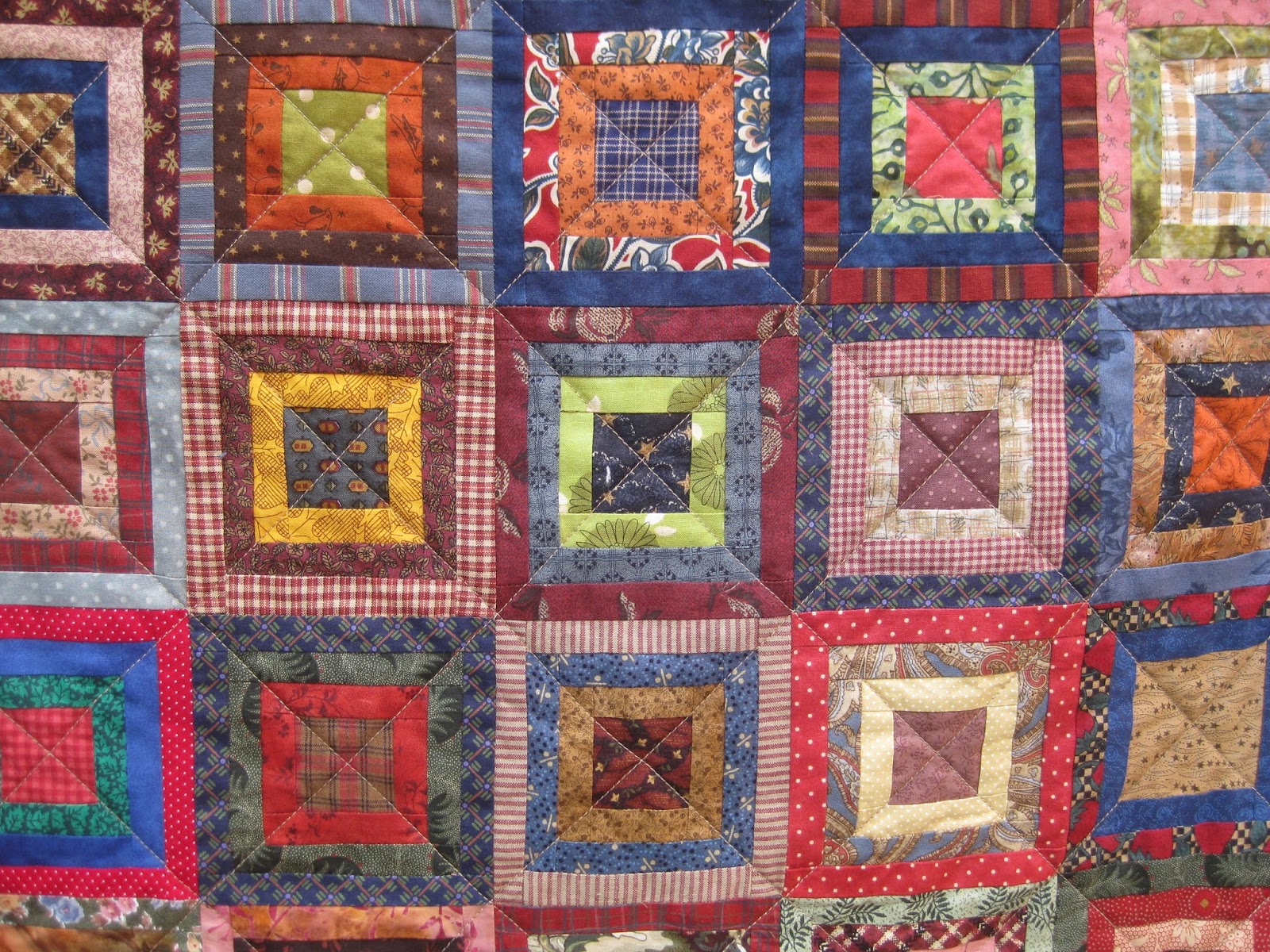 The Chain Piecer Bushel Basket quilt finished