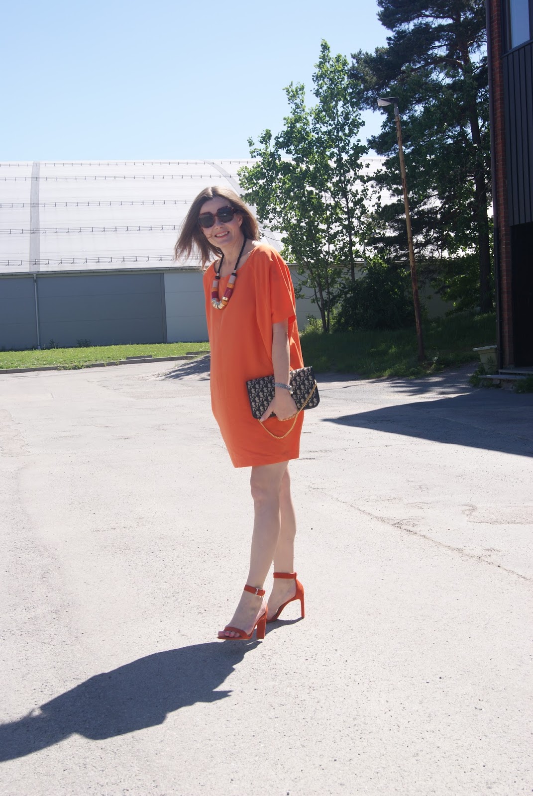 in the style orange dress