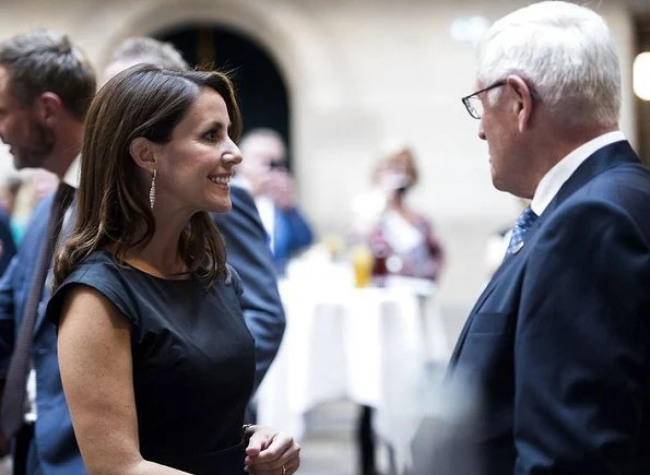 Princess Marie wore Prada dress and Hugo Boss Katniss dress, Salvatore Ferragamo res suade shoes