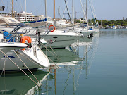 . the fancy yachts and other leisure craft on display in the marina. (port d'alcudia )