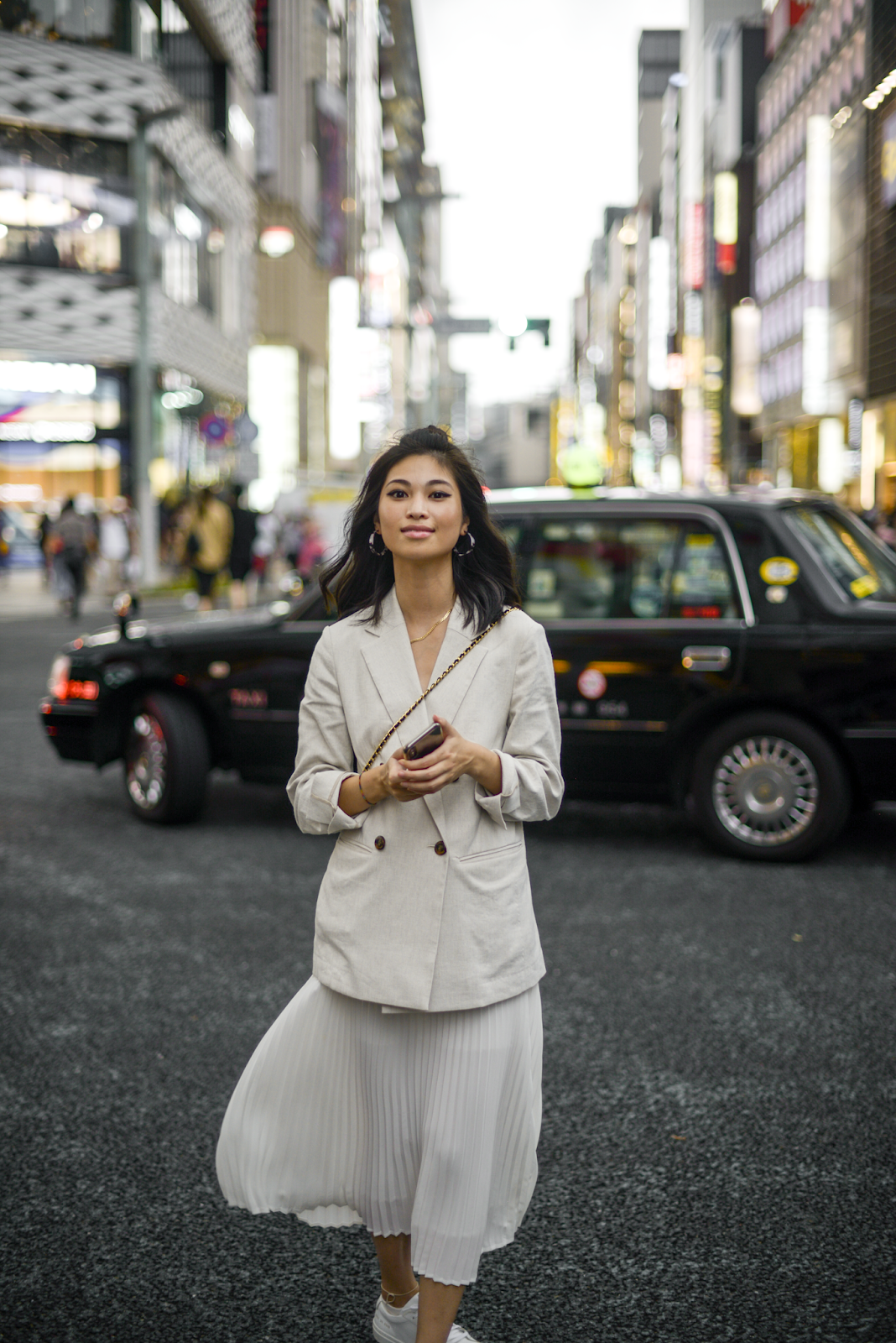 Ginza style, what to wear on Ginza, linen blazer, white pleated skirt, top knot hair style, transitional style, midi skirt and sneakers, personal style blog, August street style outfits / 082018 / 25 To Life - FOREVERVANNY