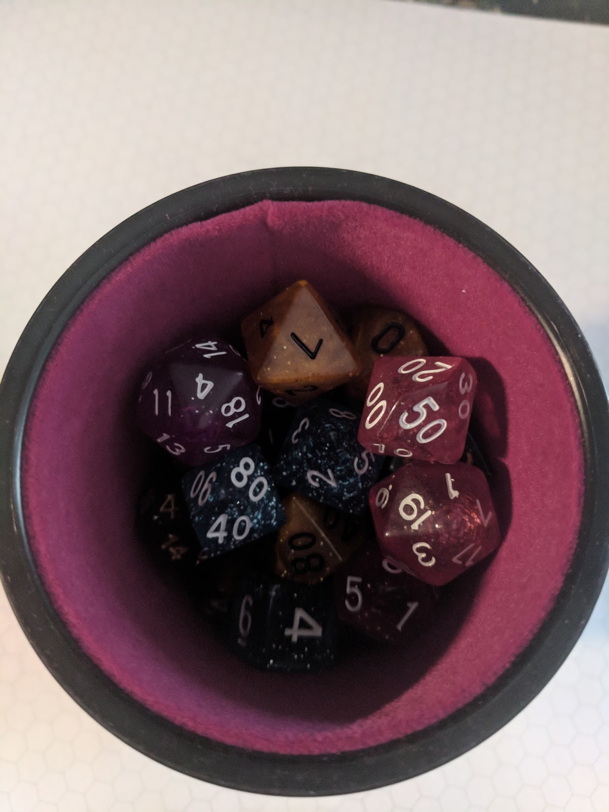 Tenkar's Tavern Dice Dice Baby Dice Bags, Dice Cup and Dice (Amazon)