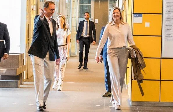 Queen Maxima wore a beige trousers by Claes Iversen, Zara beige shirt and Paloma Barcelo beige suede wedges