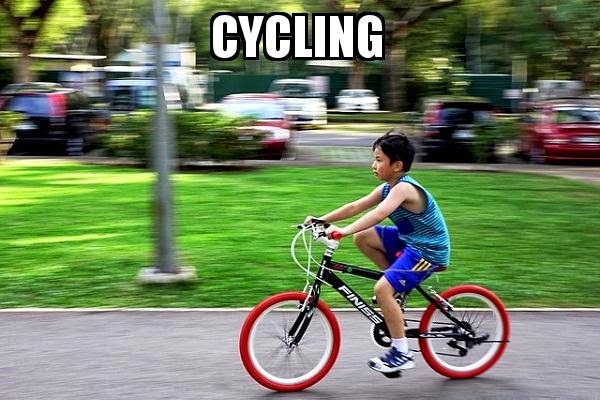 kid riding a bicycle